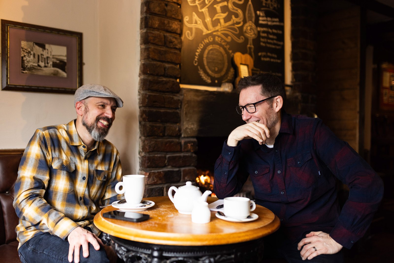 James and Garry laughing in the pub